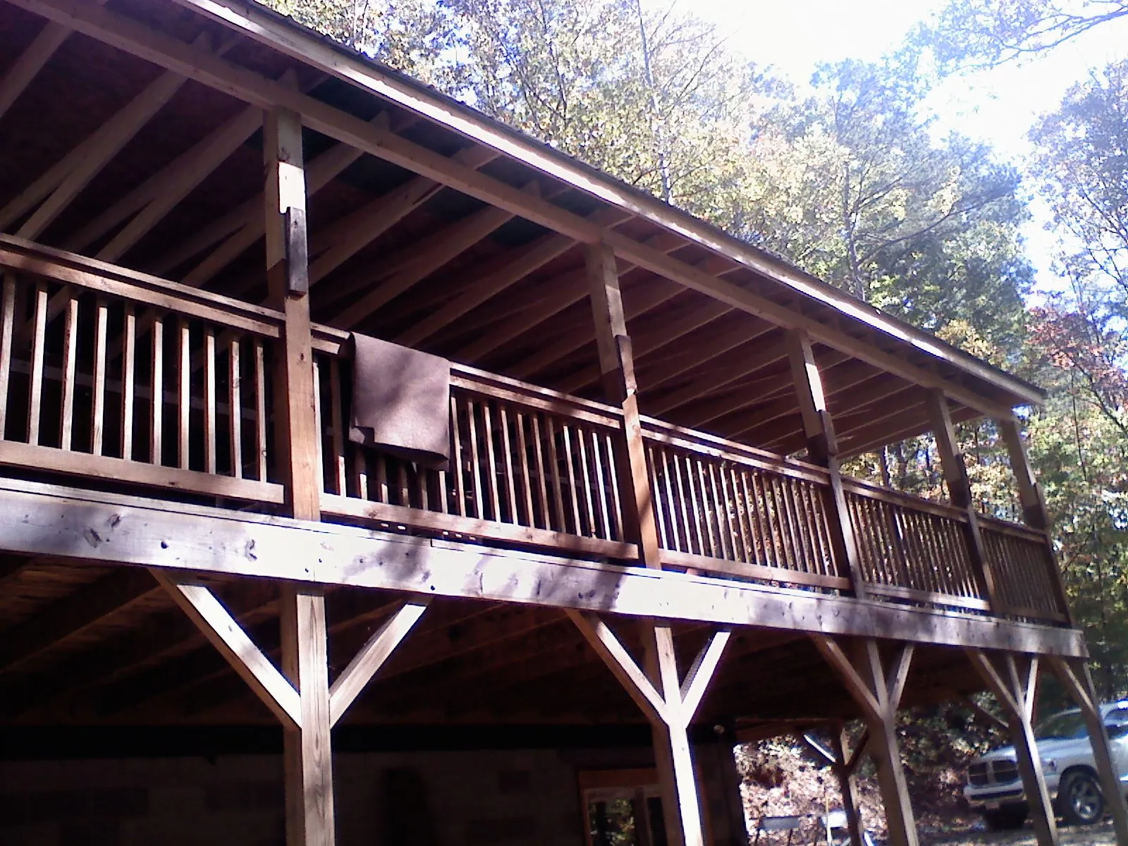 Timber framing under a new elevated porch and deck — Roof Leak Repair in Live Oak by Roofing Brothers